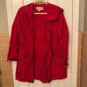 Michael Kors red cinched rain jacket with hood